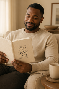 Man reading a book titled 'Seek His Face' with text about changes over 30 days.